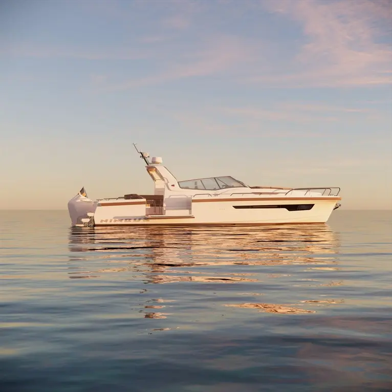 A sleek white motorboat, labelled 'Nimbus', glides on calm waters under a pastel sky at sunrise.